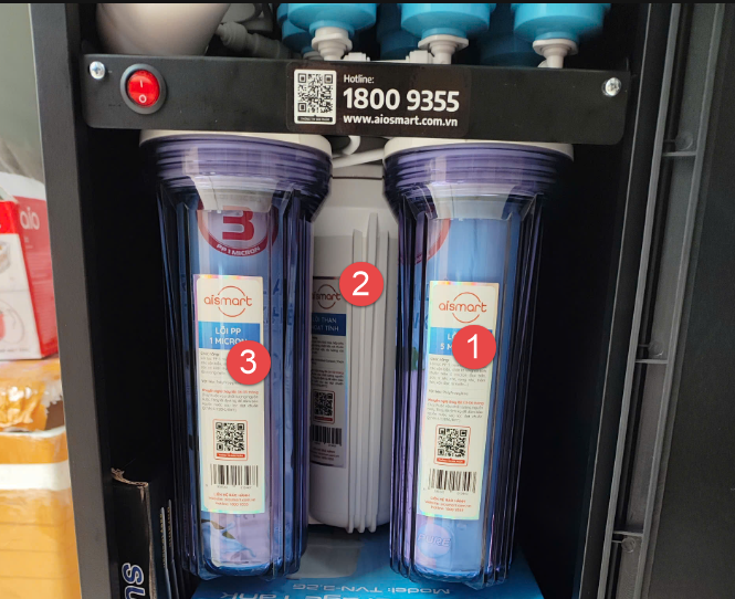 A group of water filters in a machine

Description automatically generated