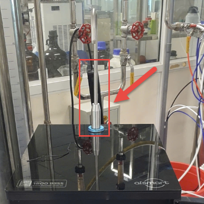 A machine with pipes and valves

Description automatically generated